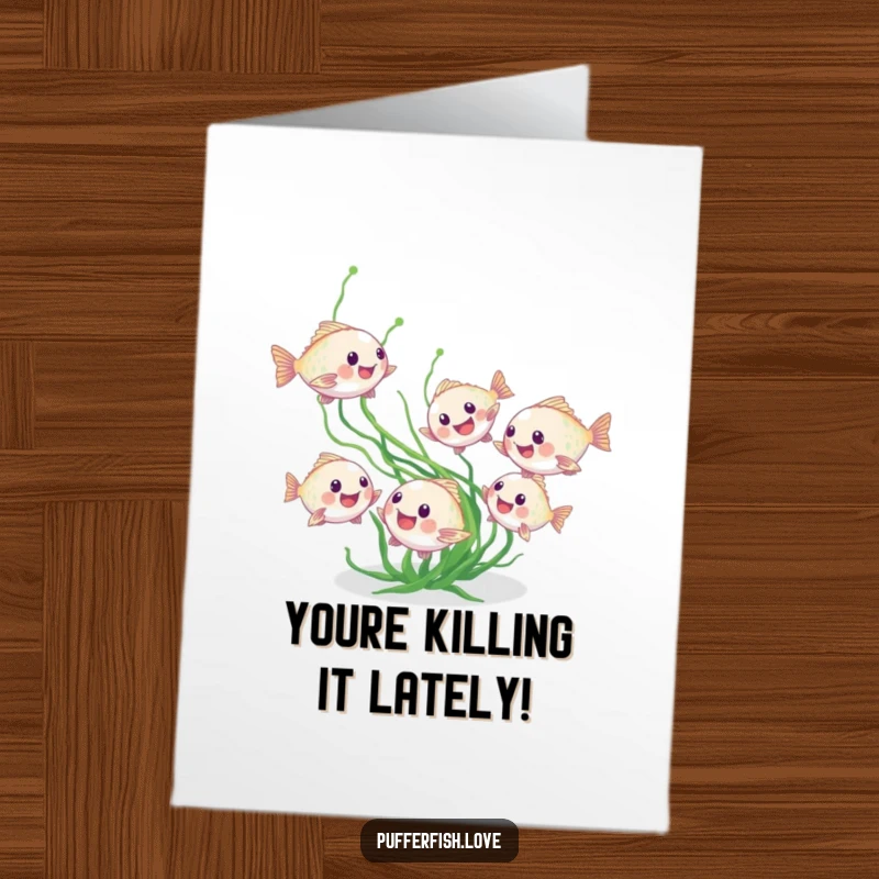 Funny Free Printable Congratulations Card with tiny pufferfish playfully chasing seaweed, symbolizing a fun and exciting achievement.